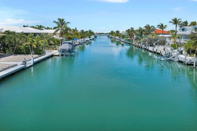 This well-maintained 2 Bedroom, 2 Bath elevated canal front half on Key Colony Beach Golf Course in Florida - for sale on GolfHomes.com, golf home, golf lot