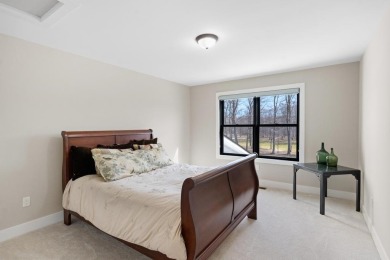 Experience elevated living at 809 Fairways Drive, located in The on Birchwood Farms Golf and Country Club in Michigan - for sale on GolfHomes.com, golf home, golf lot