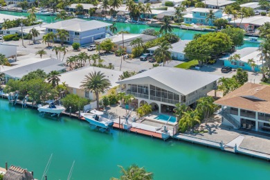This well-maintained 2 Bedroom, 2 Bath elevated canal front half on Key Colony Beach Golf Course in Florida - for sale on GolfHomes.com, golf home, golf lot