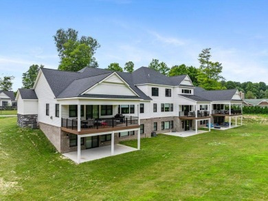Experience elevated living at 809 Fairways Drive, located in The on Birchwood Farms Golf and Country Club in Michigan - for sale on GolfHomes.com, golf home, golf lot