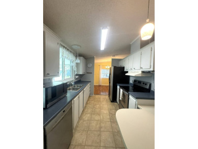 If you love to cook or entertain, this house a winner! The on Golden Lakes Golf Course in Florida - for sale on GolfHomes.com, golf home, golf lot
