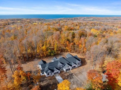 Experience elevated living at 809 Fairways Drive, located in The on Birchwood Farms Golf and Country Club in Michigan - for sale on GolfHomes.com, golf home, golf lot