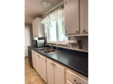 If you love to cook or entertain, this house a winner! The on Golden Lakes Golf Course in Florida - for sale on GolfHomes.com, golf home, golf lot