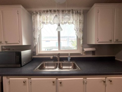 If you love to cook or entertain, this house a winner! The on Golden Lakes Golf Course in Florida - for sale on GolfHomes.com, golf home, golf lot