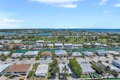 This well-maintained 2 Bedroom, 2 Bath elevated canal front half on Key Colony Beach Golf Course in Florida - for sale on GolfHomes.com, golf home, golf lot