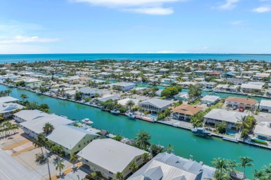 This well-maintained 2 Bedroom, 2 Bath elevated canal front half on Key Colony Beach Golf Course in Florida - for sale on GolfHomes.com, golf home, golf lot