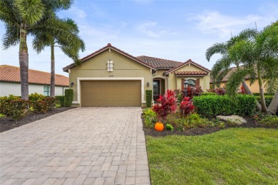 Experience resort-style living every day in this beautifully on Esplanade Golf and Country at Lakewood Ranch in Florida - for sale on GolfHomes.com, golf home, golf lot