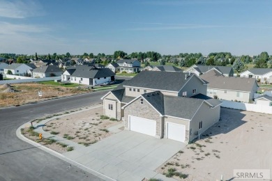 Situated on 0.29 acres, its brand-new faade exudes modern on Sage Lakes Municipal Golf Course in Idaho - for sale on GolfHomes.com, golf home, golf lot