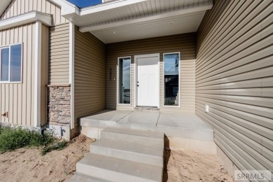 Situated on 0.29 acres, its brand-new faade exudes modern on Sage Lakes Municipal Golf Course in Idaho - for sale on GolfHomes.com, golf home, golf lot