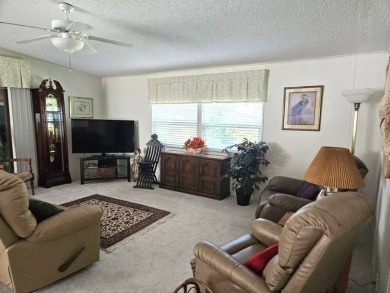 Welcome Home to this beautiful well-maintained 2-bedroom, 2-bath on Crystal Lake Club in Florida - for sale on GolfHomes.com, golf home, golf lot