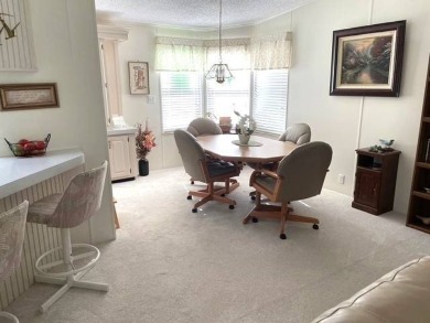 Welcome Home to this beautiful well-maintained 2-bedroom, 2-bath on Crystal Lake Club in Florida - for sale on GolfHomes.com, golf home, golf lot