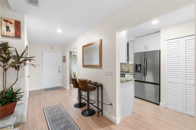 Beautifully updated 1,426 sqft two-story townhouse in the on Boca Lago Golf and Country Club in Florida - for sale on GolfHomes.com, golf home, golf lot