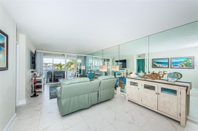 MILLION DOLLAR VIEW.. PRIVATE COMMUNITY BEACH.. FULLY UPDATED on Isla Del Sol Yacht and Country Club in Florida - for sale on GolfHomes.com, golf home, golf lot