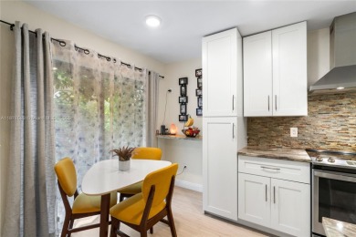 Beautifully updated 1,426 sqft two-story townhouse in the on Boca Lago Golf and Country Club in Florida - for sale on GolfHomes.com, golf home, golf lot