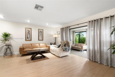 Beautifully updated 1,426 sqft two-story townhouse in the on Boca Lago Golf and Country Club in Florida - for sale on GolfHomes.com, golf home, golf lot