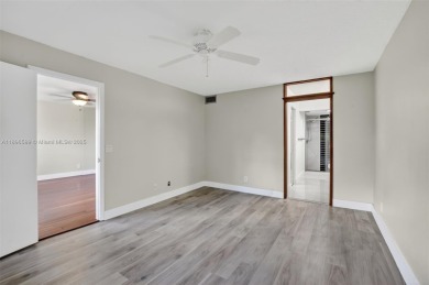 Experience resort-style living at exceptional value with this on Sunrise Lakes Phase IV Golf Course in Florida - for sale on GolfHomes.com, golf home, golf lot