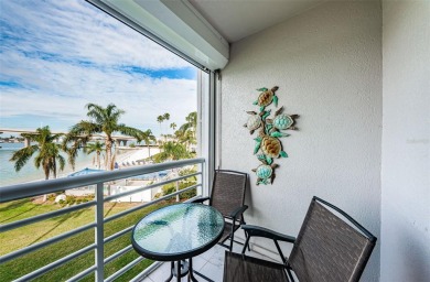 MILLION DOLLAR VIEW.. PRIVATE COMMUNITY BEACH.. FULLY UPDATED on Isla Del Sol Yacht and Country Club in Florida - for sale on GolfHomes.com, golf home, golf lot