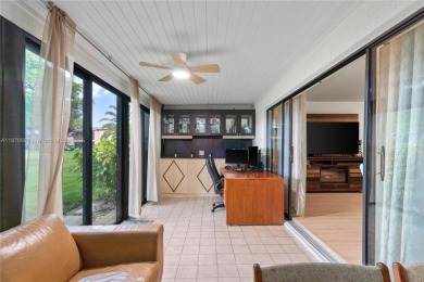 Beautifully updated 1,426 sqft two-story townhouse in the on Boca Lago Golf and Country Club in Florida - for sale on GolfHomes.com, golf home, golf lot