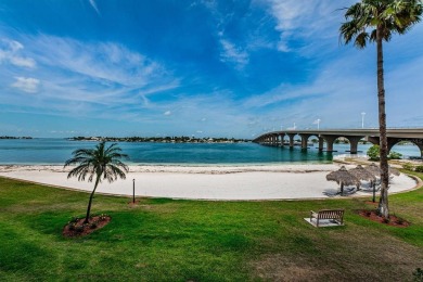 MILLION DOLLAR VIEW.. PRIVATE COMMUNITY BEACH.. FULLY UPDATED on Isla Del Sol Yacht and Country Club in Florida - for sale on GolfHomes.com, golf home, golf lot
