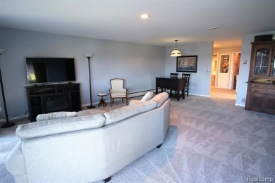 This stunning and spacious end unit condominium with premium on St Clair River Country Club in Michigan - for sale on GolfHomes.com, golf home, golf lot