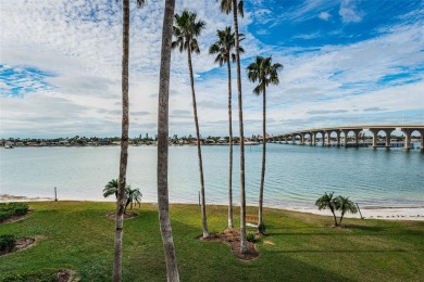 MILLION DOLLAR VIEW.. PRIVATE COMMUNITY BEACH.. FULLY UPDATED on Isla Del Sol Yacht and Country Club in Florida - for sale on GolfHomes.com, golf home, golf lot