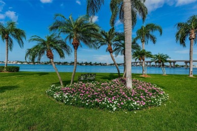 MILLION DOLLAR VIEW.. PRIVATE COMMUNITY BEACH.. FULLY UPDATED on Isla Del Sol Yacht and Country Club in Florida - for sale on GolfHomes.com, golf home, golf lot