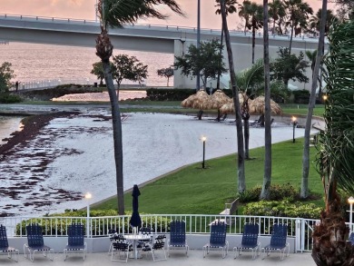 MILLION DOLLAR VIEW.. PRIVATE COMMUNITY BEACH.. FULLY UPDATED on Isla Del Sol Yacht and Country Club in Florida - for sale on GolfHomes.com, golf home, golf lot