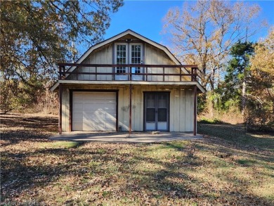 Nice 3 bedroom, 2 bath home on approx. 1.19-acre lot. Located on on Vache-Grasse Country Club in Arkansas - for sale on GolfHomes.com, golf home, golf lot