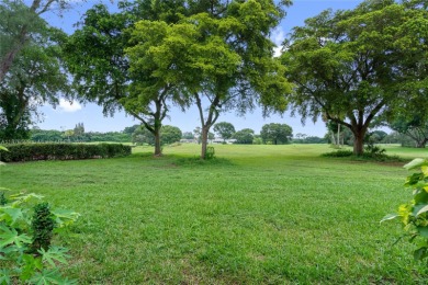 Beautifully updated 1,426 sqft two-story townhouse in the on Boca Lago Golf and Country Club in Florida - for sale on GolfHomes.com, golf home, golf lot