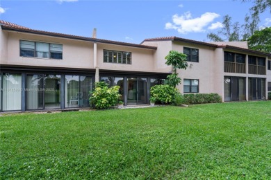 Beautifully updated 1,426 sqft two-story townhouse in the on Boca Lago Golf and Country Club in Florida - for sale on GolfHomes.com, golf home, golf lot