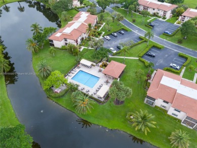 Beautifully updated 1,426 sqft two-story townhouse in the on Boca Lago Golf and Country Club in Florida - for sale on GolfHomes.com, golf home, golf lot