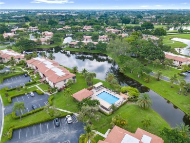 Beautifully updated 1,426 sqft two-story townhouse in the on Boca Lago Golf and Country Club in Florida - for sale on GolfHomes.com, golf home, golf lot