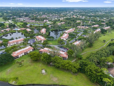 Beautifully updated 1,426 sqft two-story townhouse in the on Boca Lago Golf and Country Club in Florida - for sale on GolfHomes.com, golf home, golf lot
