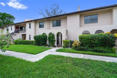 Beautifully updated 1,426 sqft two-story townhouse in the on Boca Lago Golf and Country Club in Florida - for sale on GolfHomes.com, golf home, golf lot