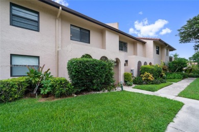 Beautifully updated 1,426 sqft two-story townhouse in the on Boca Lago Golf and Country Club in Florida - for sale on GolfHomes.com, golf home, golf lot