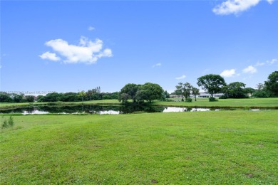 Beautifully updated 1,426 sqft two-story townhouse in the on Boca Lago Golf and Country Club in Florida - for sale on GolfHomes.com, golf home, golf lot