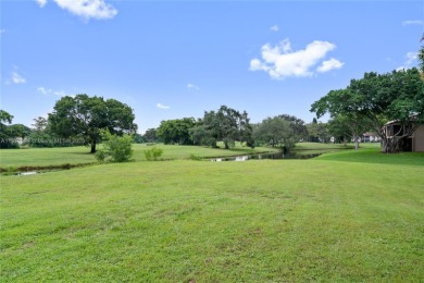 Beautifully updated 1,426 sqft two-story townhouse in the on Boca Lago Golf and Country Club in Florida - for sale on GolfHomes.com, golf home, golf lot