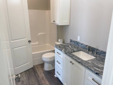 This beautiful move in ready lake house is open and airy and SOLD on Lake Bruin Golf and Country Club in Louisiana - for sale on GolfHomes.com, golf home, golf lot