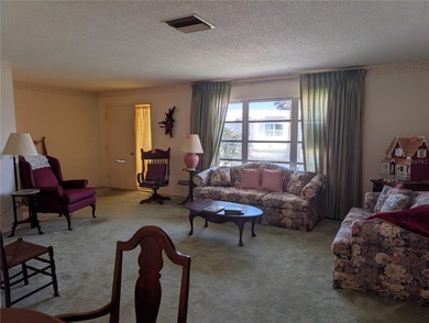 SOLD AS IS ***Located in the desirable Mainlands of Tamarac By on Mainlands Golf Club in Florida - for sale on GolfHomes.com, golf home, golf lot