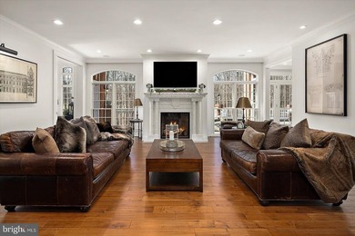 Set behind a private automated gate on nearly 3 acres, this on Golf Club At South River in Maryland - for sale on GolfHomes.com, golf home, golf lot