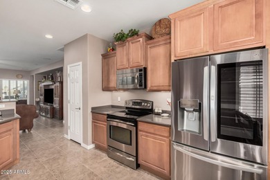 Immaculate single-level home with a bright, open floor plan on The Golf Club At Johnson Ranch in Arizona - for sale on GolfHomes.com, golf home, golf lot