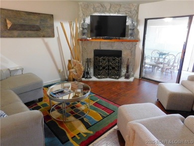 This ground-floor, 1-story, end unit enjoys easy access from the on Seasons Ridge At Four Seasons in Missouri - for sale on GolfHomes.com, golf home, golf lot