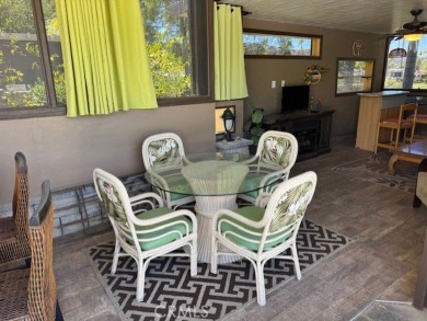 If stunning views make you smile, this property is guaranteed to on Rancho California RV Resort in California - for sale on GolfHomes.com, golf home, golf lot