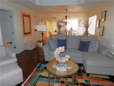 This ground-floor, 1-story, end unit enjoys easy access from the on Seasons Ridge At Four Seasons in Missouri - for sale on GolfHomes.com, golf home, golf lot