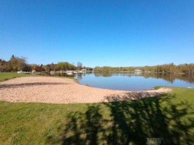 SUGAR SPRINGS! Get ready to enjoy this ultimate Up North getaway on Lakeside Golf Course in Michigan - for sale on GolfHomes.com, golf home, golf lot