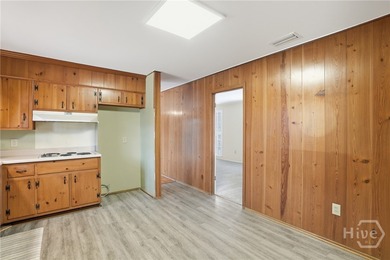 Nestled in one of Savannah's Original Golf Course Communities on La Vida Country Club in Georgia - for sale on GolfHomes.com, golf home, golf lot