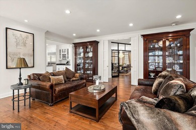 Set behind a private automated gate on nearly 3 acres, this on Golf Club At South River in Maryland - for sale on GolfHomes.com, golf home, golf lot