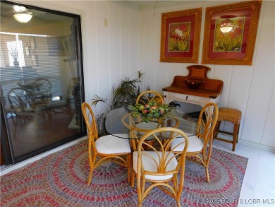 This ground-floor, 1-story, end unit enjoys easy access from the on Seasons Ridge At Four Seasons in Missouri - for sale on GolfHomes.com, golf home, golf lot