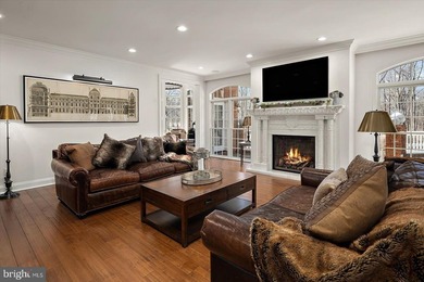 Set behind a private automated gate on nearly 3 acres, this on Golf Club At South River in Maryland - for sale on GolfHomes.com, golf home, golf lot