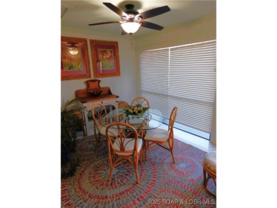 This ground-floor, 1-story, end unit enjoys easy access from the on Seasons Ridge At Four Seasons in Missouri - for sale on GolfHomes.com, golf home, golf lot